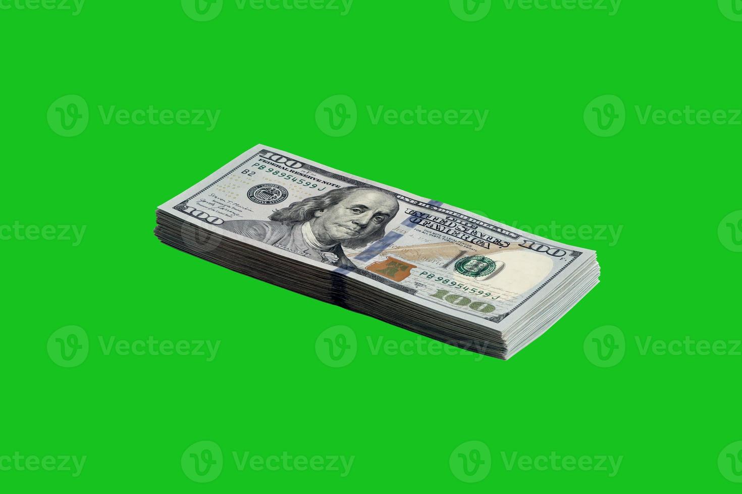 Bundle of US dollar bills isolated on chroma keyer green. Pack of american money with high resolution on perfect green mask photo