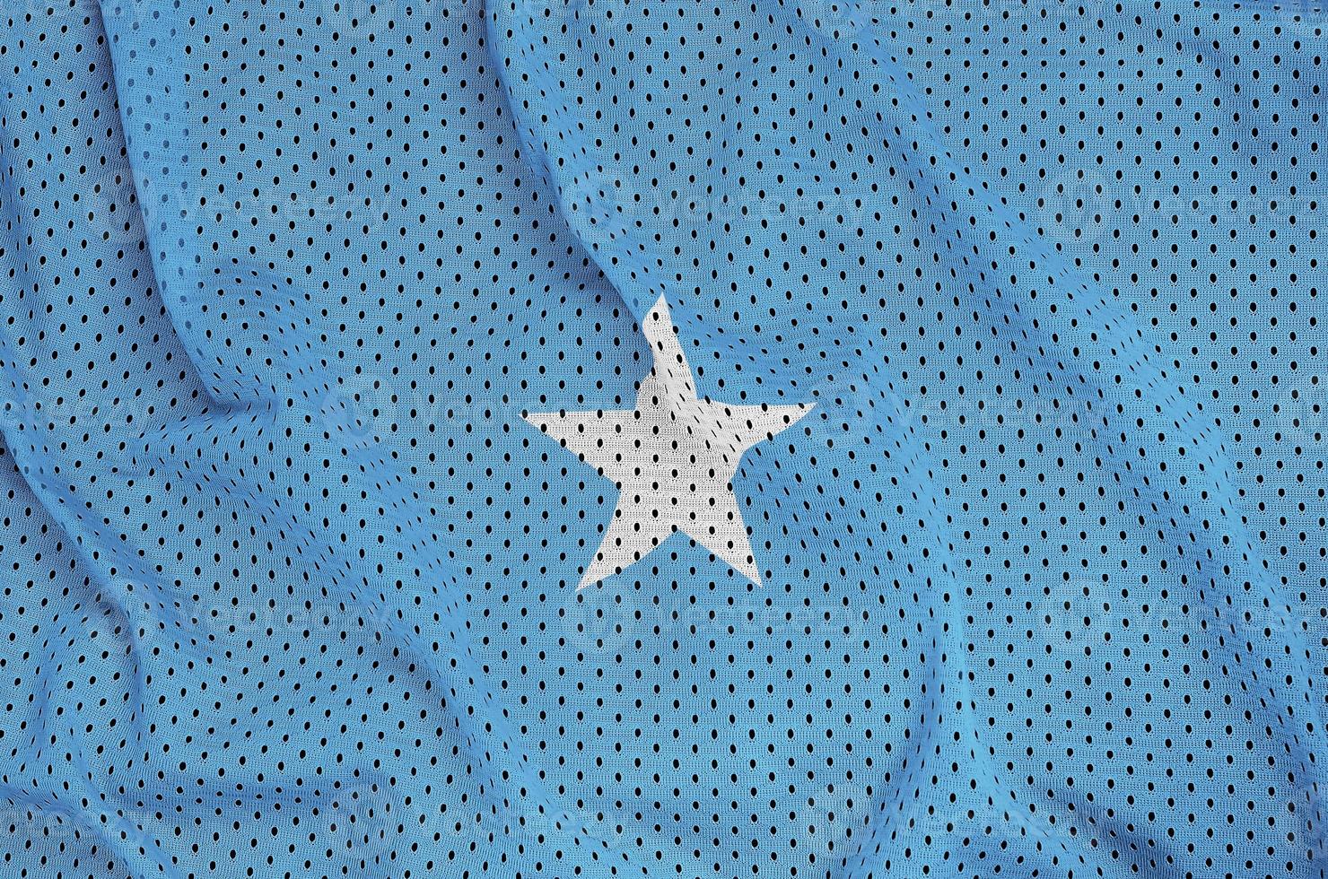 Somalia flag printed on a polyester nylon sportswear mesh fabric photo