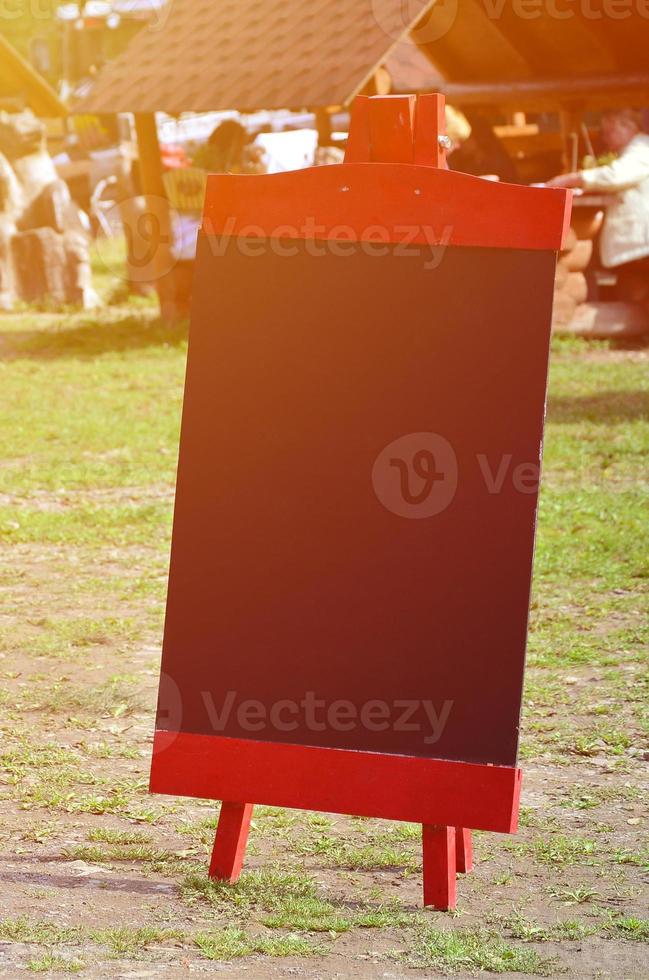 A large board as a menu for an open-air restaurant in a mountainous area. Free space for your text photo