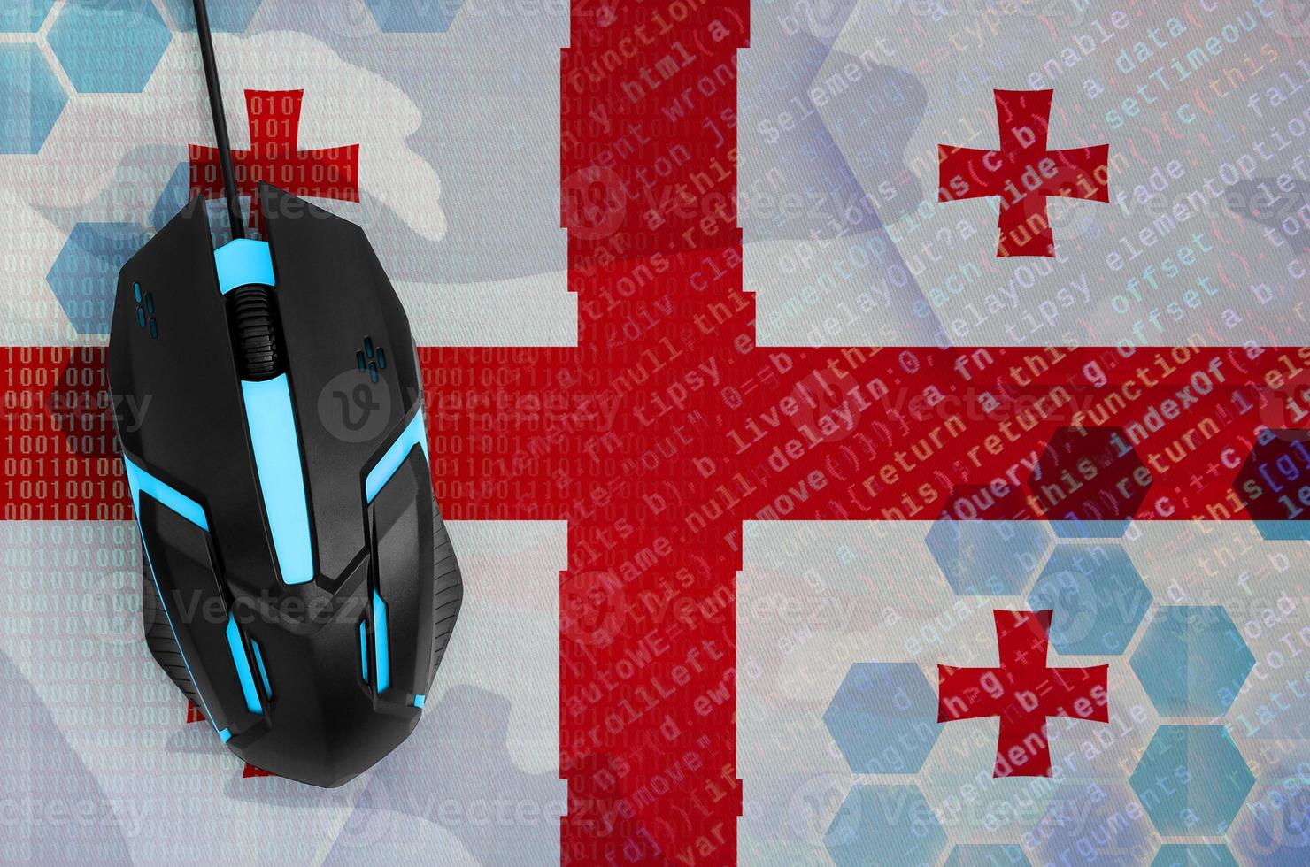 Georgia flag  and computer mouse. Digital threat, illegal actions on the Internet photo