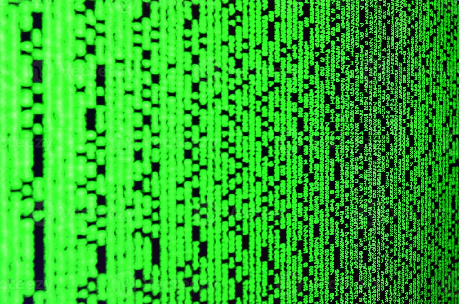 Macro of password selection on the monitor of the office computer. The concept of hacking the protection of a personal data keeper. The stream of supposed digital passwords of four and five digits photo