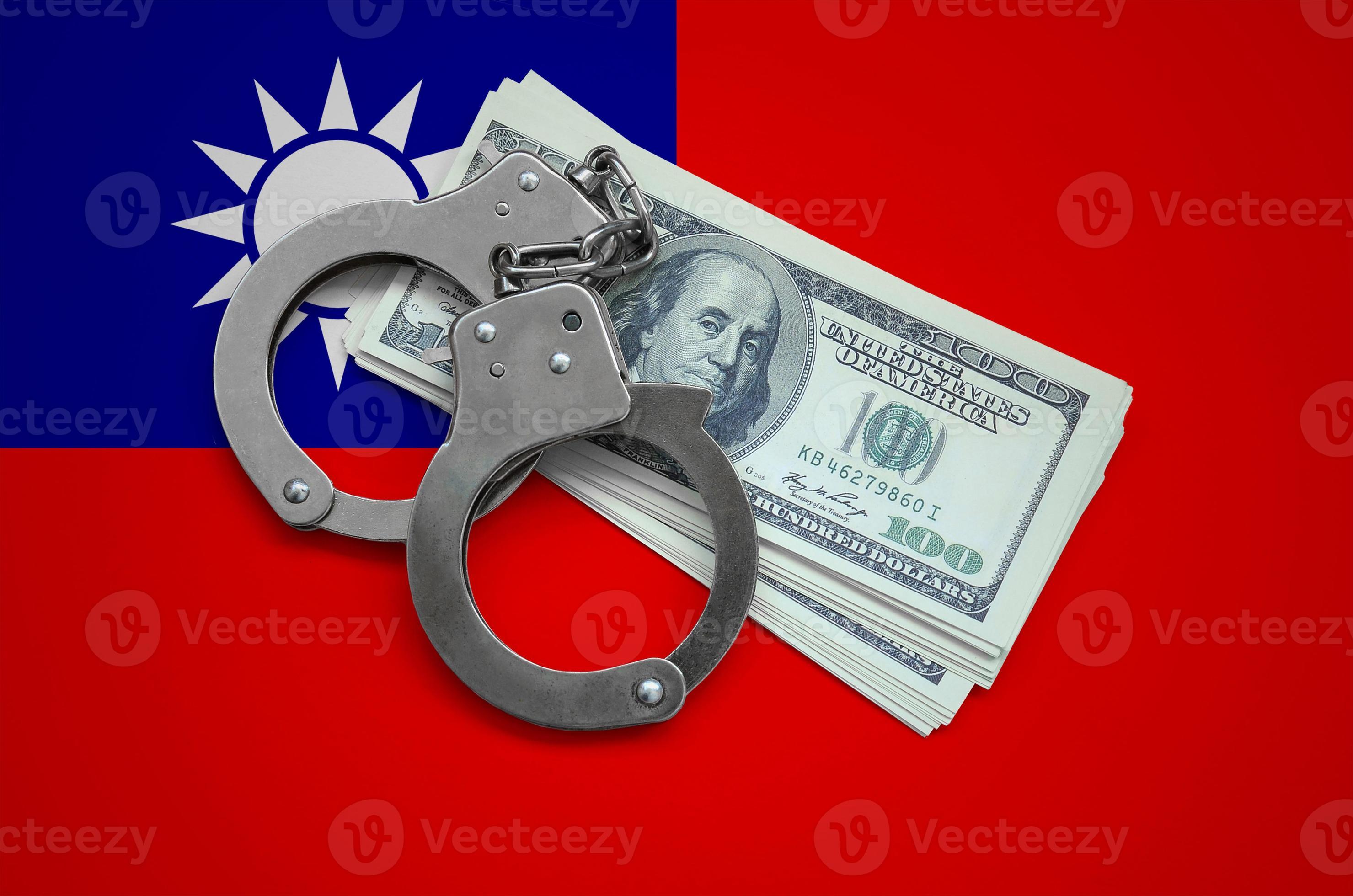 Taiwan flag with handcuffs and a bundle of dollars. Currency corruption