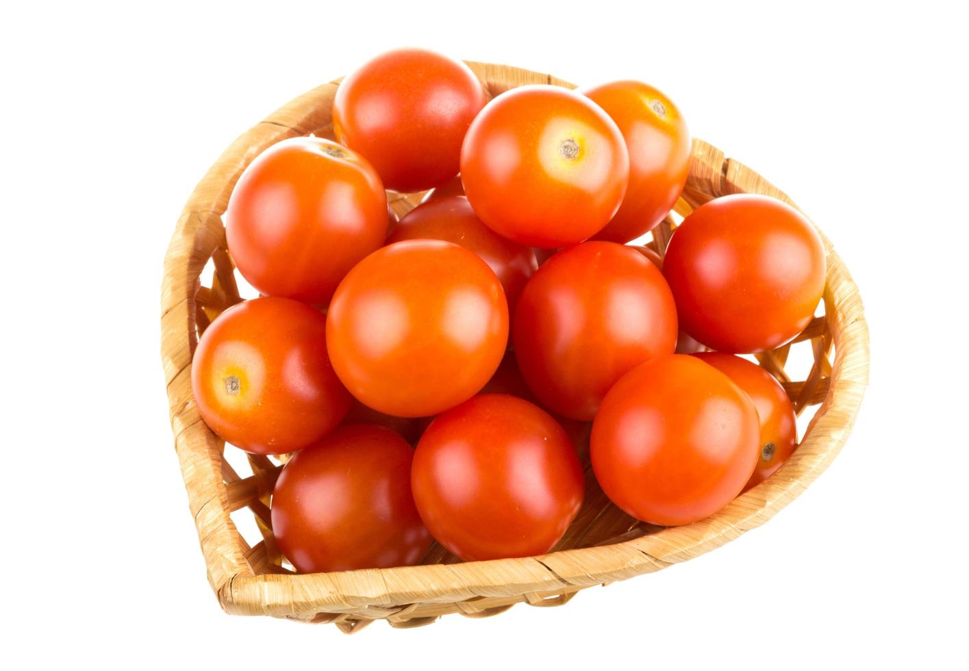 Cherry tomatoes on white photo