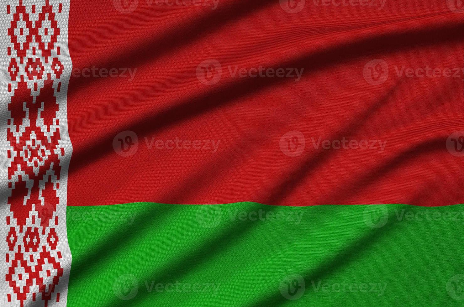 Belarus flag  is depicted on a sports cloth fabric with many folds. Sport team banner photo