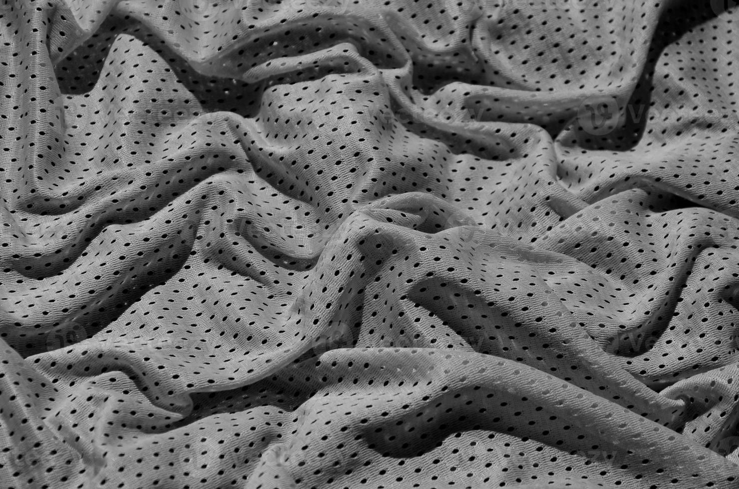 Sport clothing fabric texture background, top view of grey cloth textile surface photo