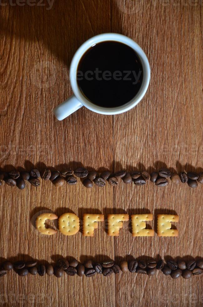 English word Coffee, made up of salt cracker letters photo