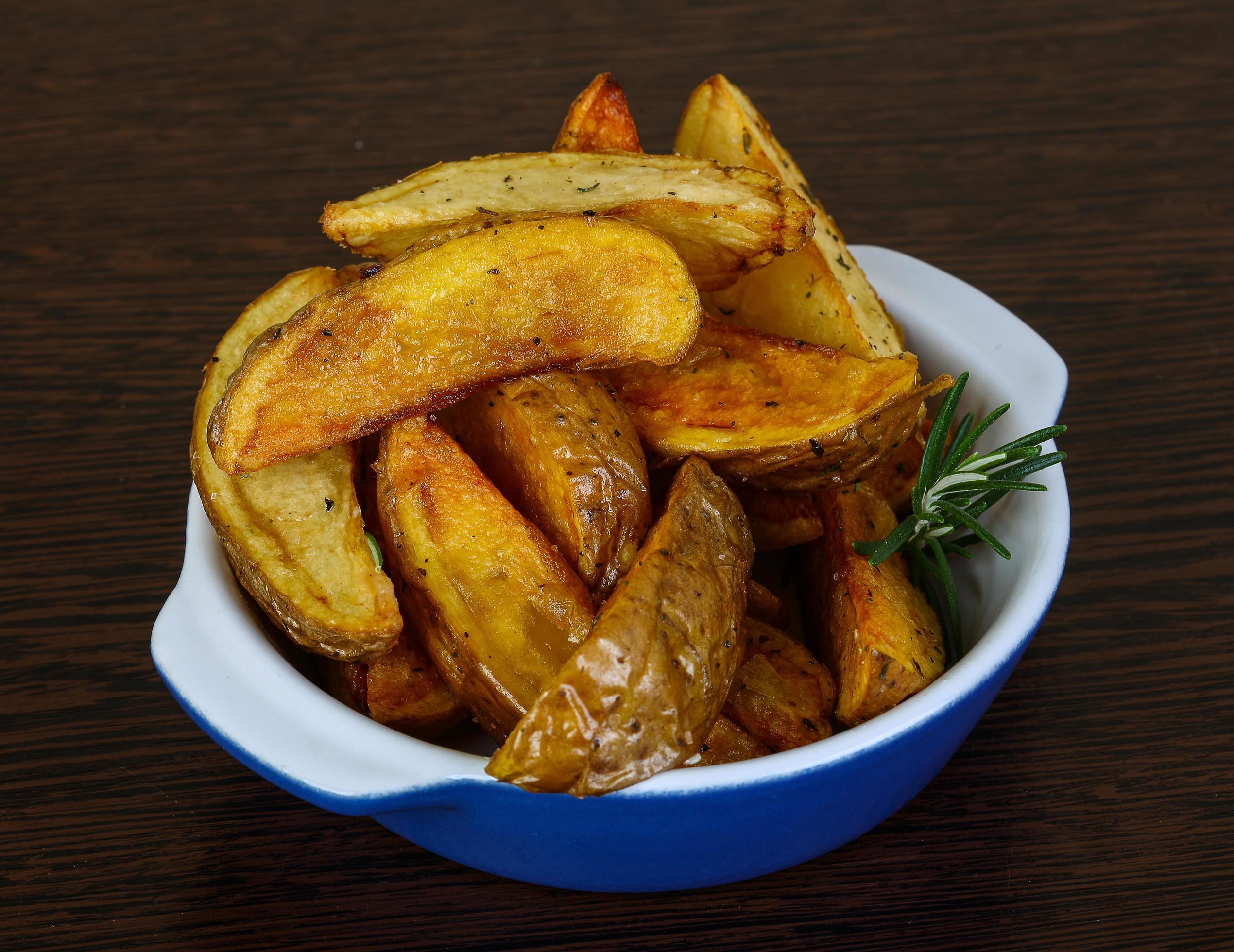 Roasted potato dish view 12841948 Stock Photo at Vecteezy