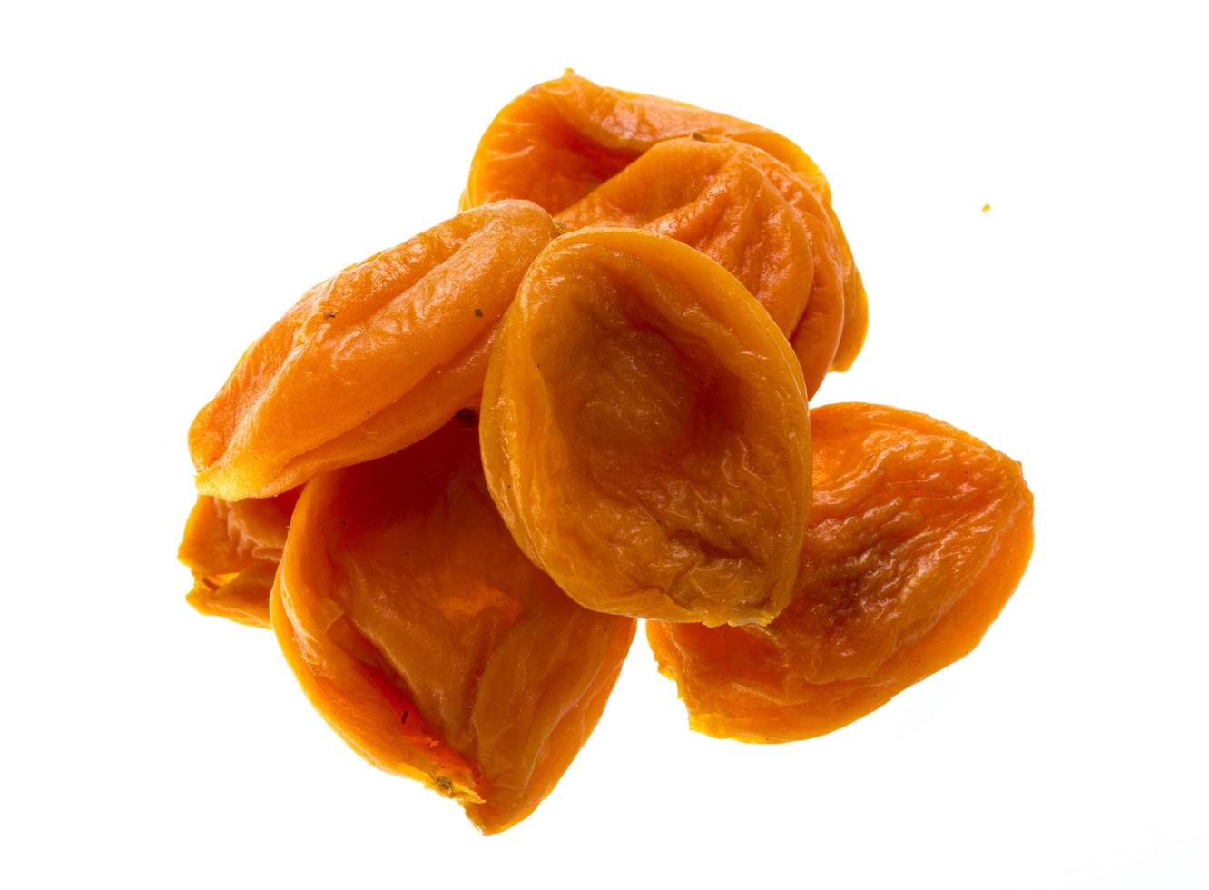 Dried apricot on white photo