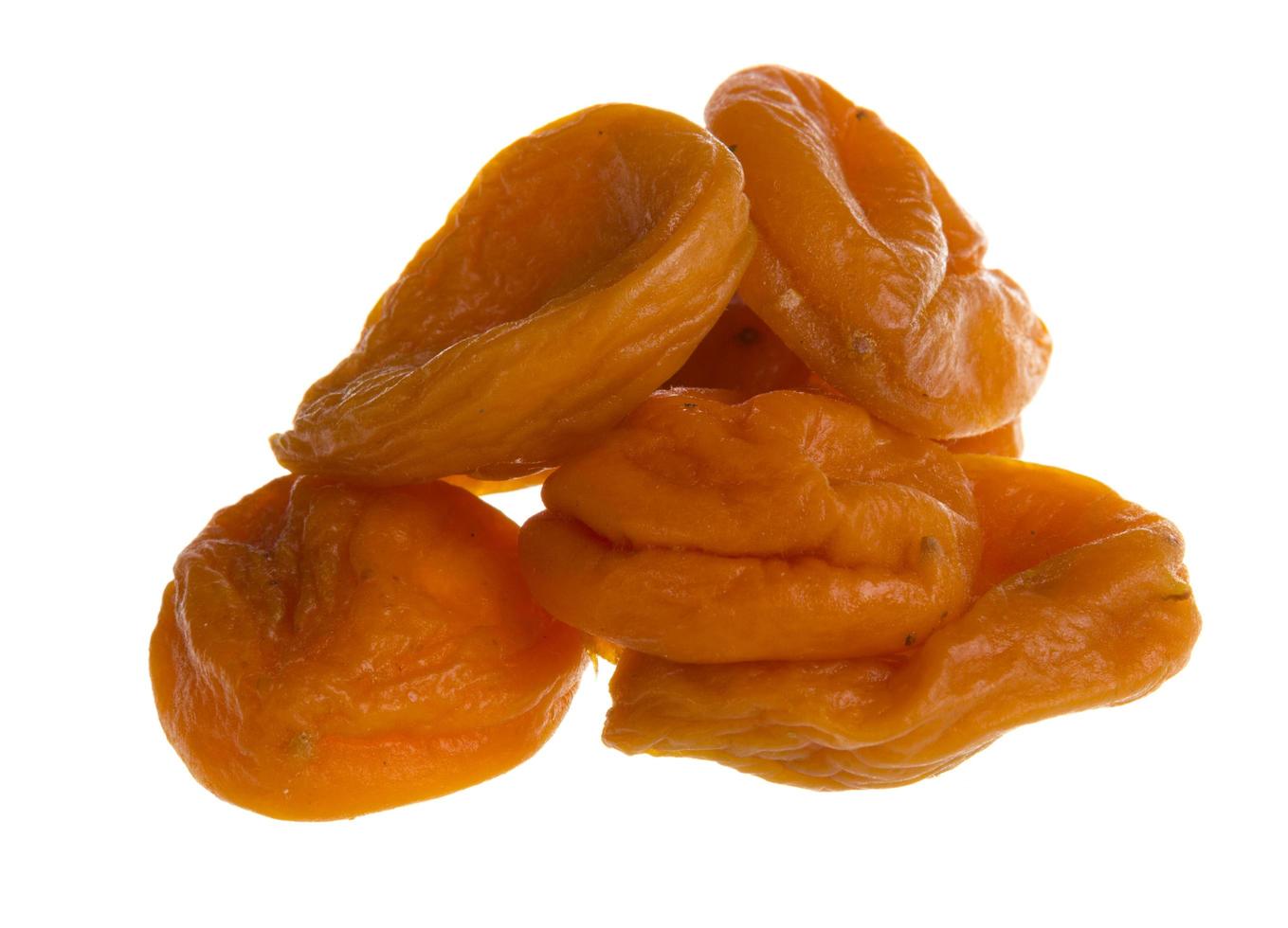 Dried apricot on white photo