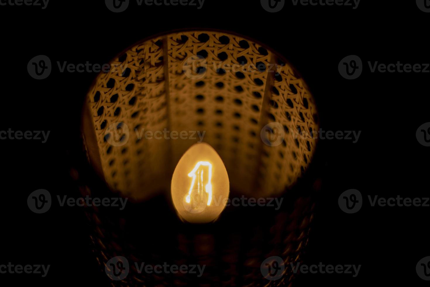 Lamp in dark. Object in interior. Lampshade for lamp. photo