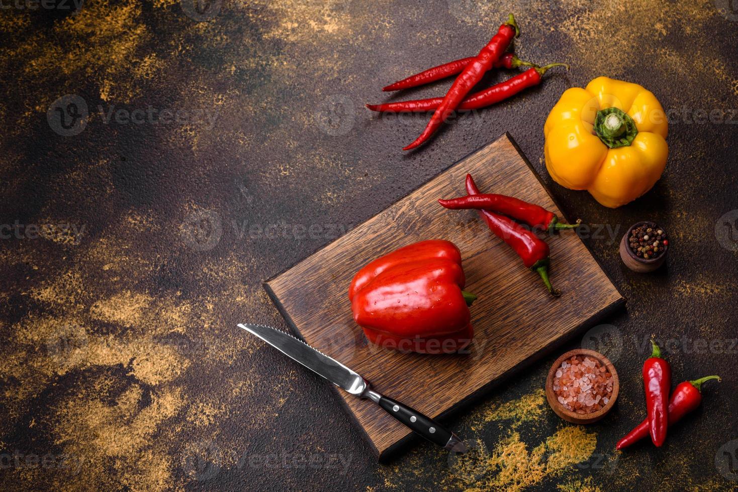 Fresh torn red sweet pepper from the autumn harvest photo