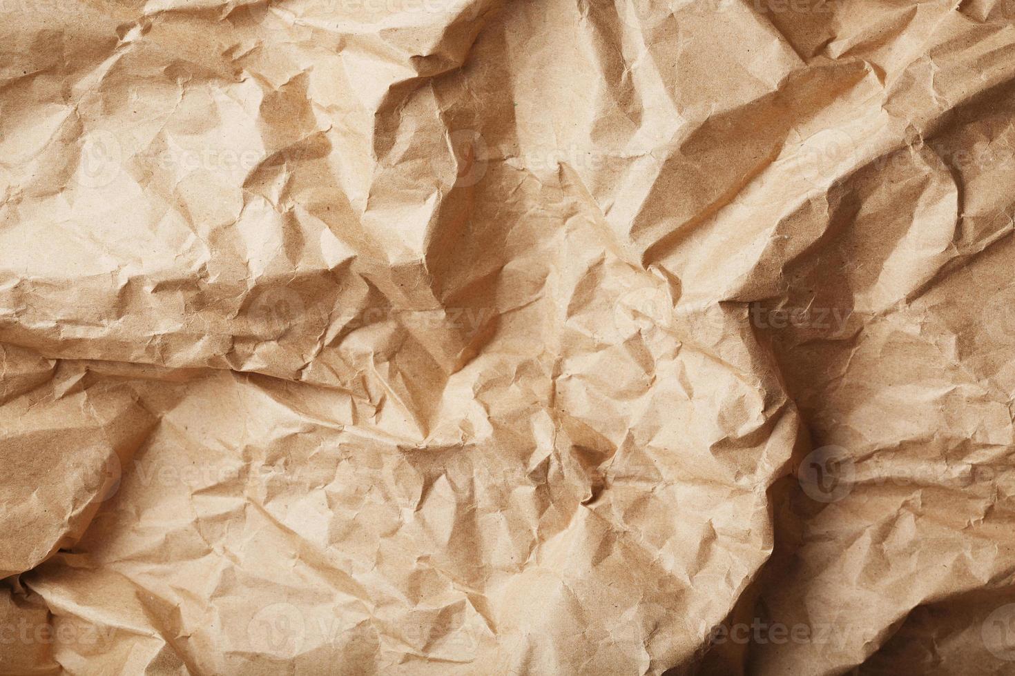 Craft crumpled paper as a texture background. photo