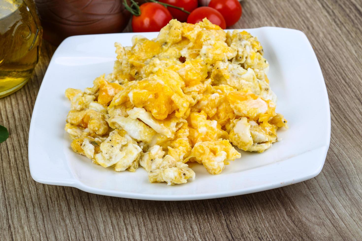 Scrambled eggs on wood photo