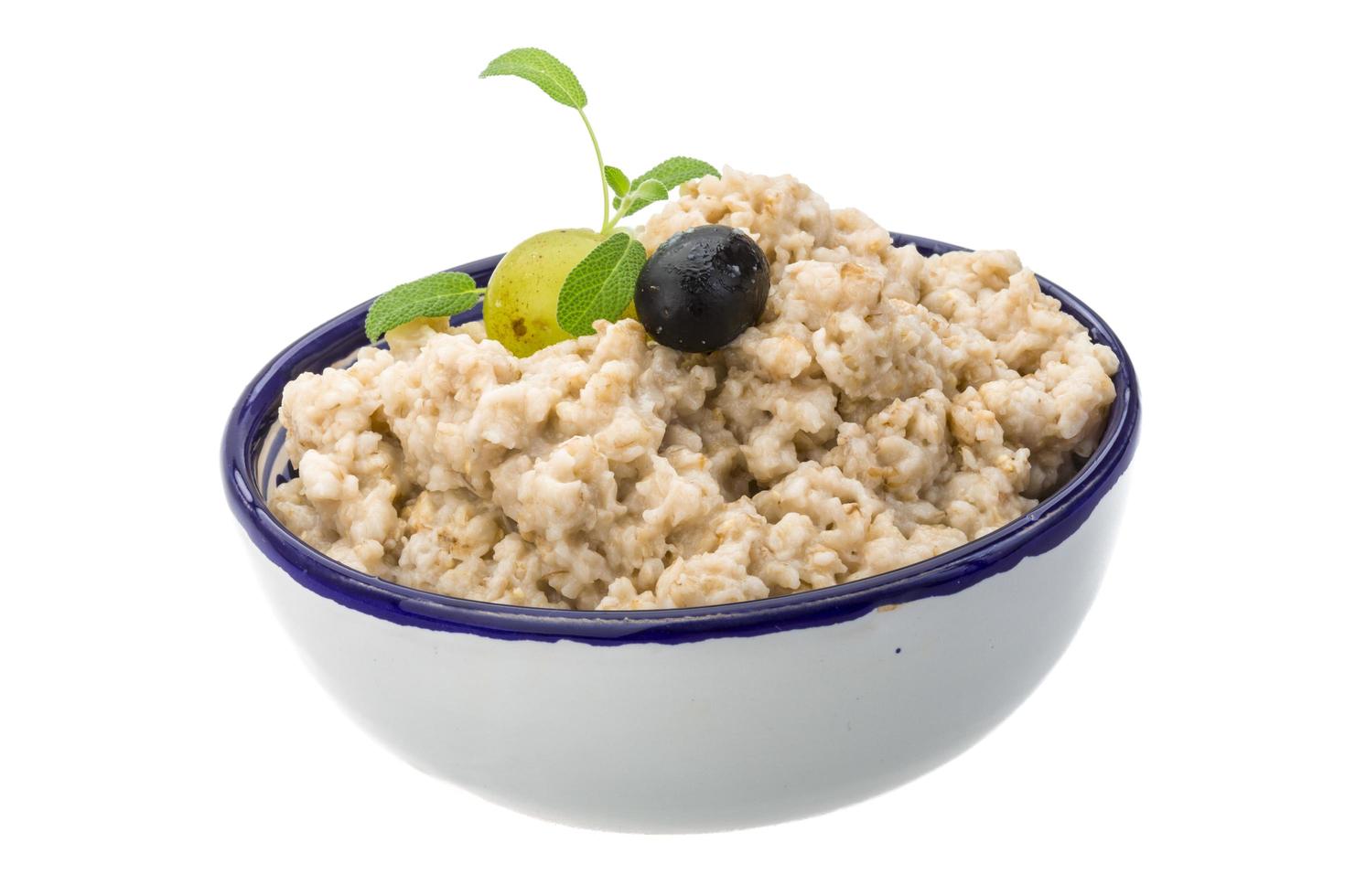 Oats porridge on white photo