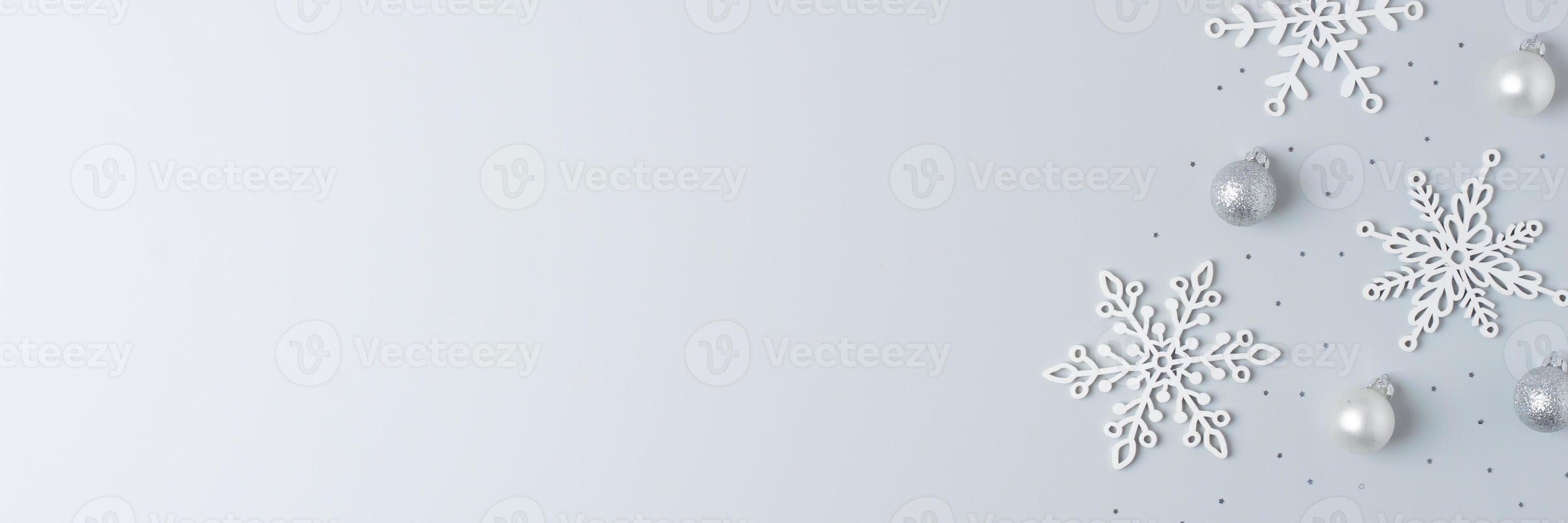 Christmas background with grey ball on grey background. Flat lay, copy space photo