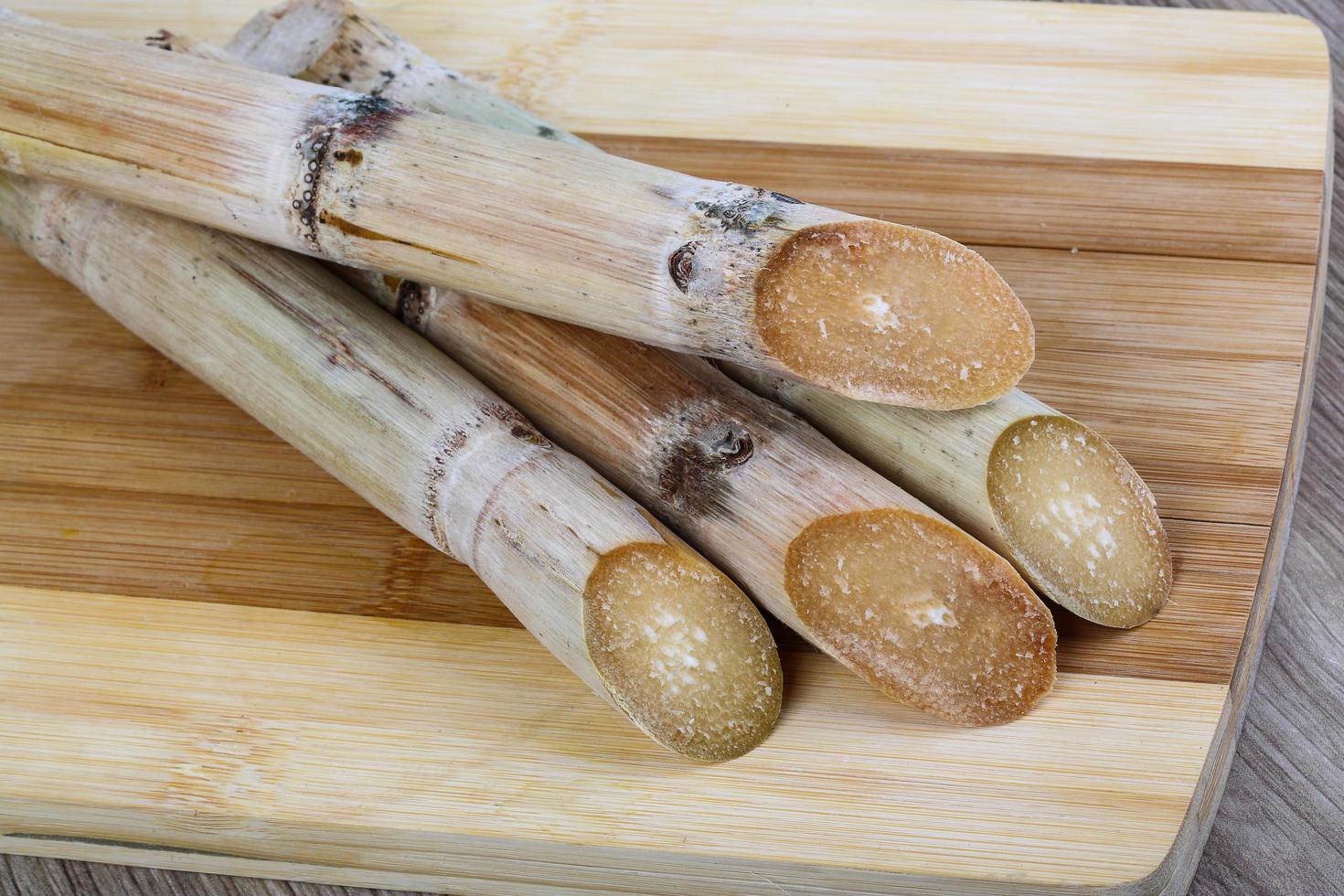 Bamboo shoots on wood photo