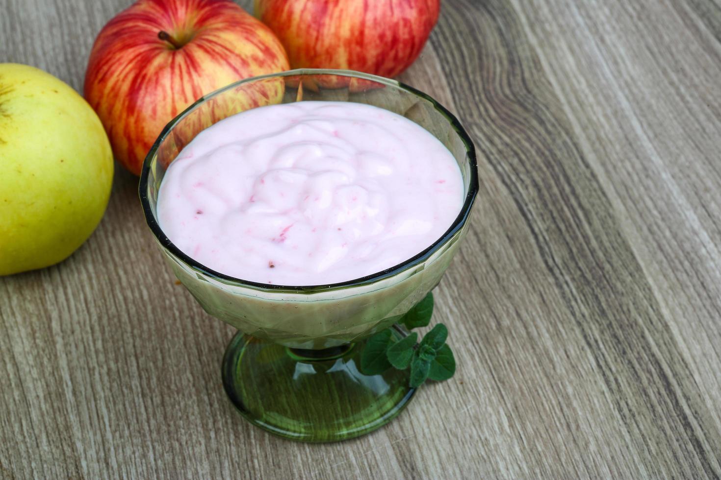 Strawberry yoghurt on wood photo