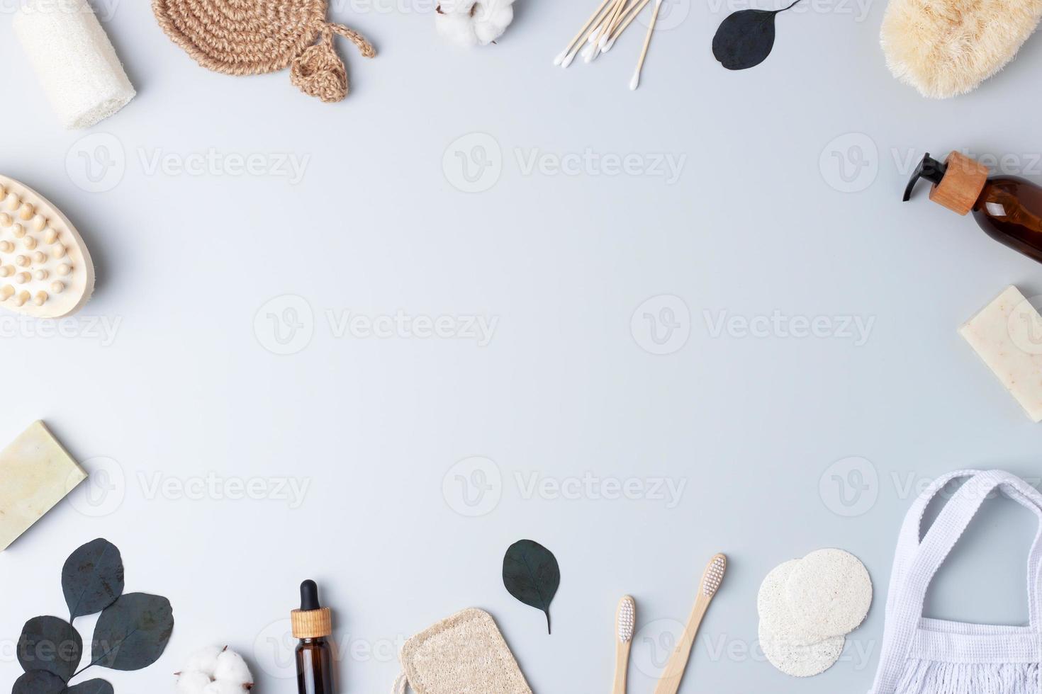 Zero waste, sustainable and eco-friendly lifestyle. Bathroom natural products from reusable materials on grey background. Flat lay, copy space photo