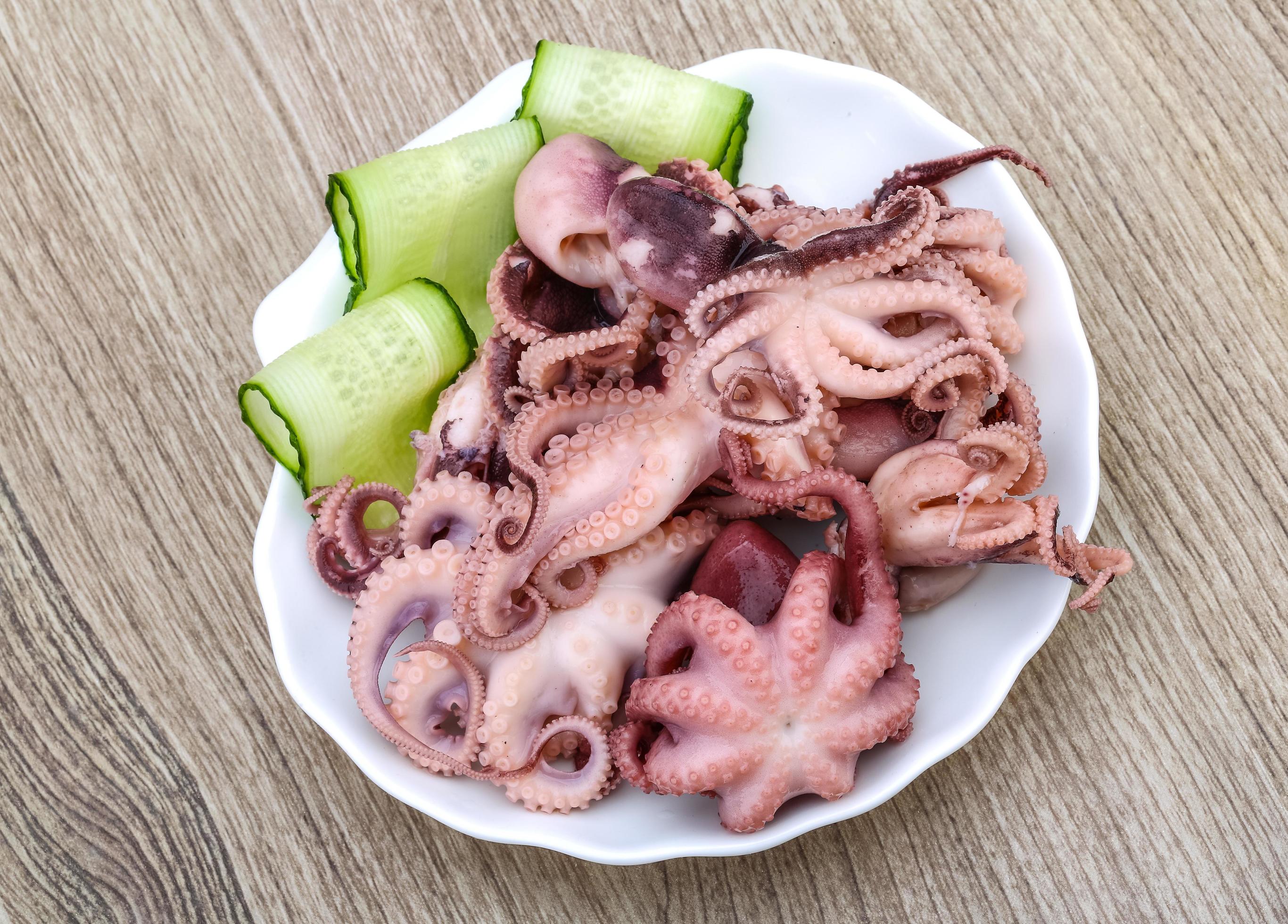 Marinated octopus dish view 12844157 Stock Photo at Vecteezy