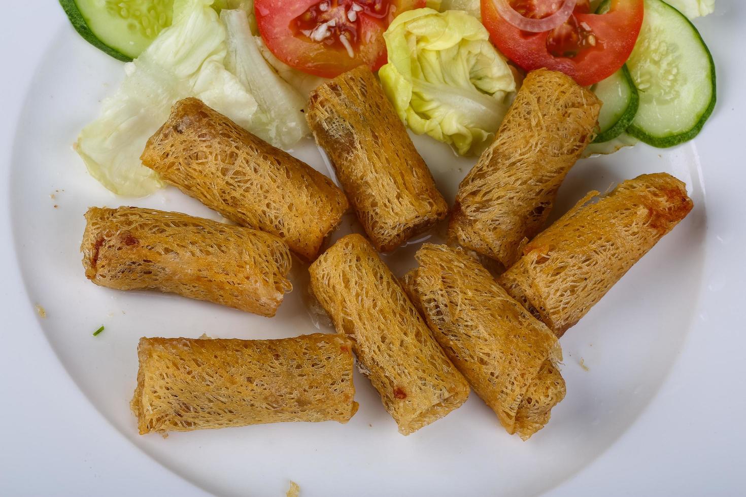 Spring rolls on wood photo