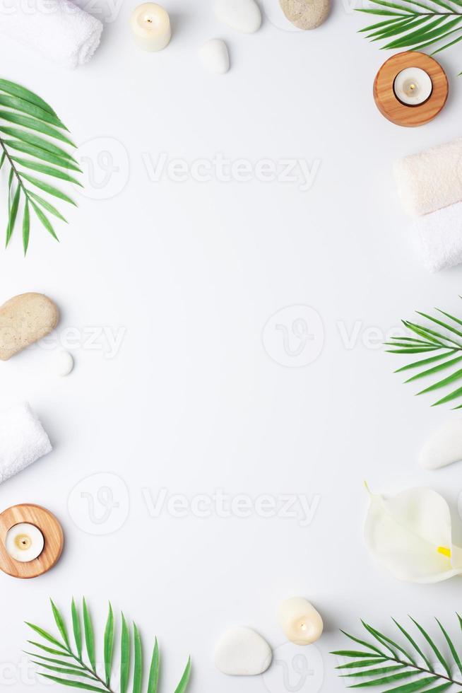 Home decoration with candles and flowers over white wall. Interior design concept. Close up, copy space photo