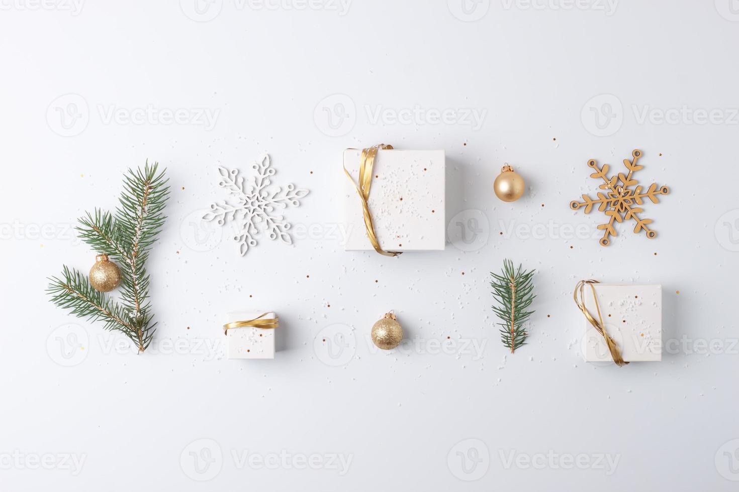 Christmas decorations with gifts on white background. Flat lay, copy space photo