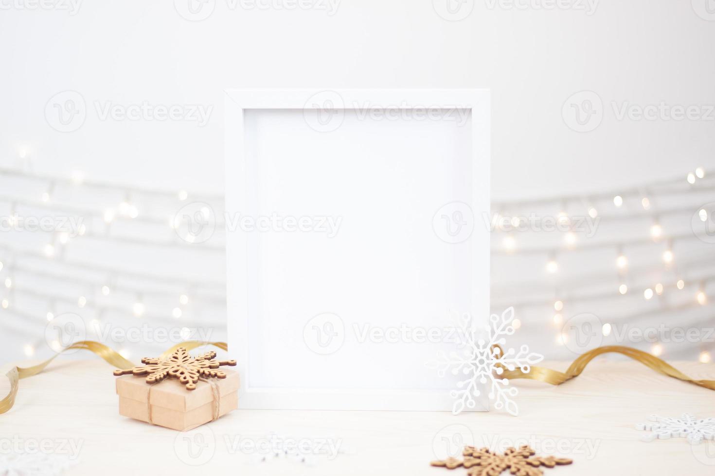 Zero waste Christmas natural decoration with white mock up frame on table. Close up, copy space photo