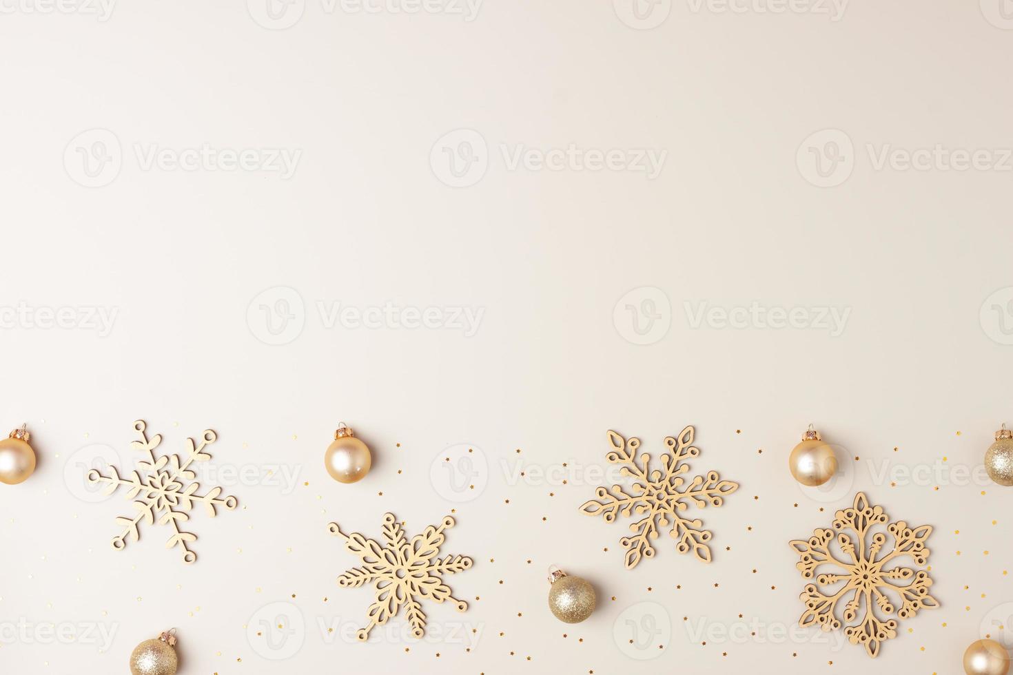 Christmas beige minimal background with snowflakes. Flat lay, copy space photo