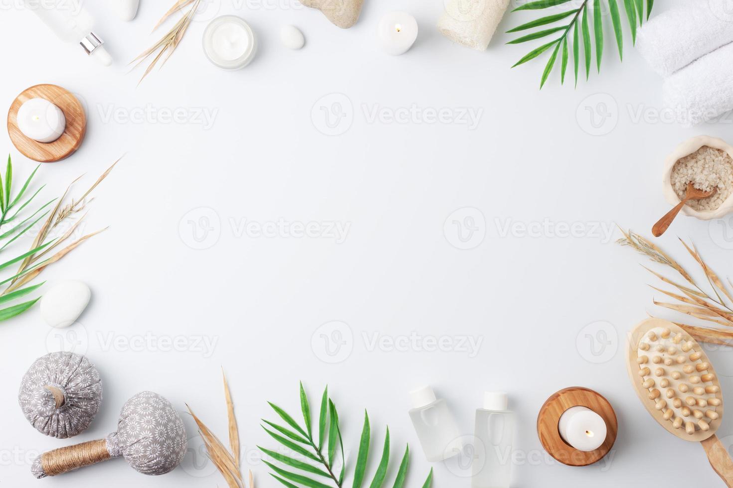 Spa treatment with natural skin care products, herbal bags, towel and wash on white background. Flat lay, copy space. photo