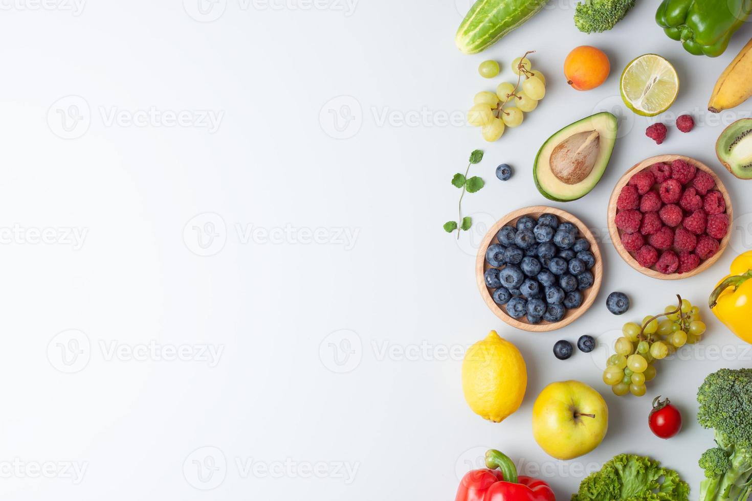 Fresh fruits and vegetables on grey background. Healthy eating concept. Flat lay, copy space