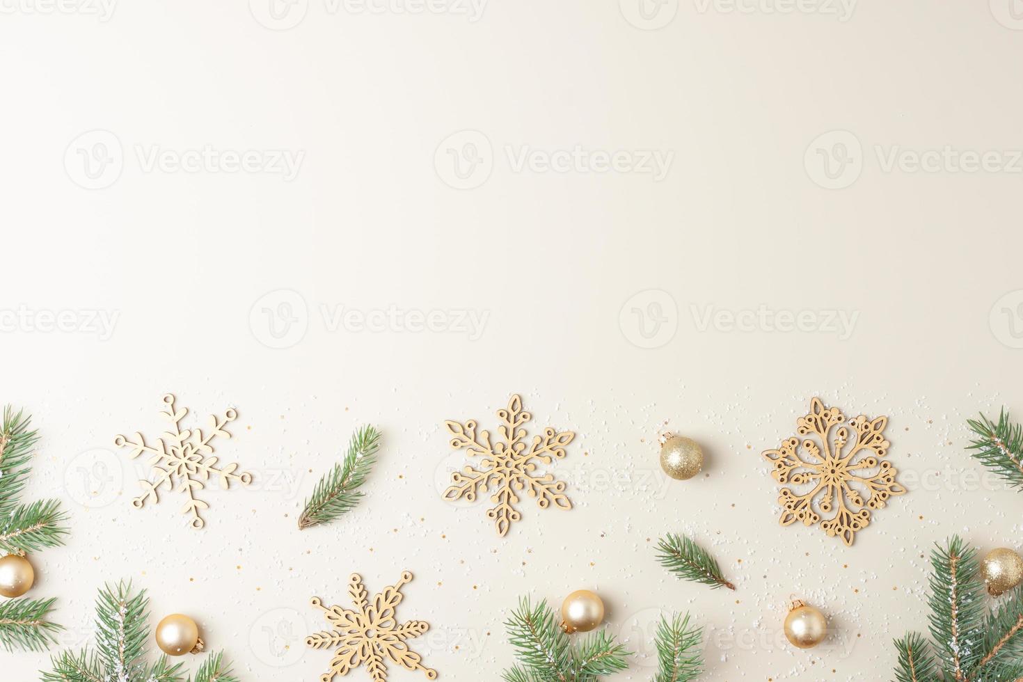 Christmas background with Christmas decorations on beige pastel. Flat lay, copy space photo