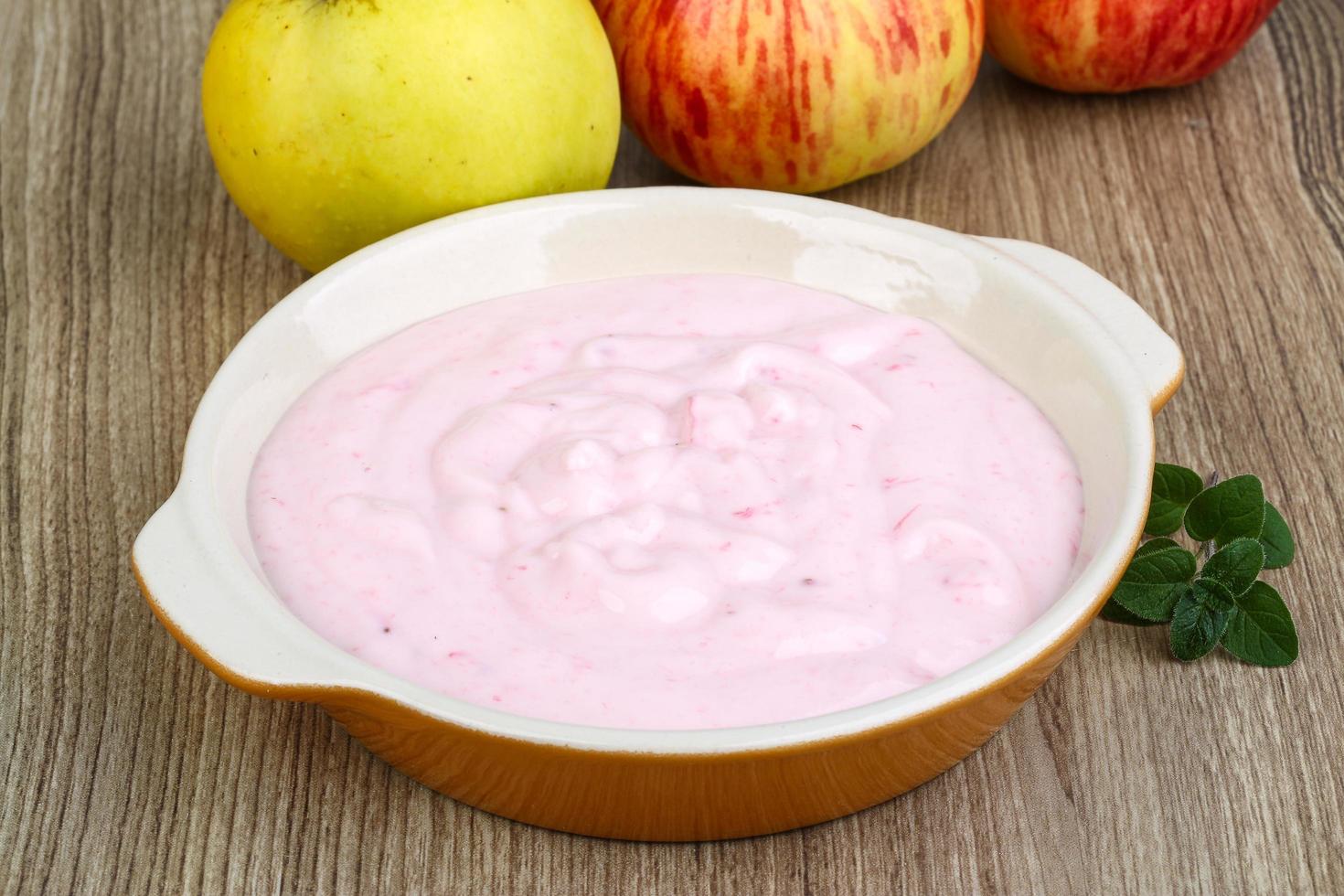 Strawberry yoghurt on wood photo