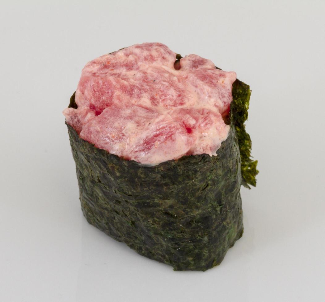 Tuna sushi on white photo