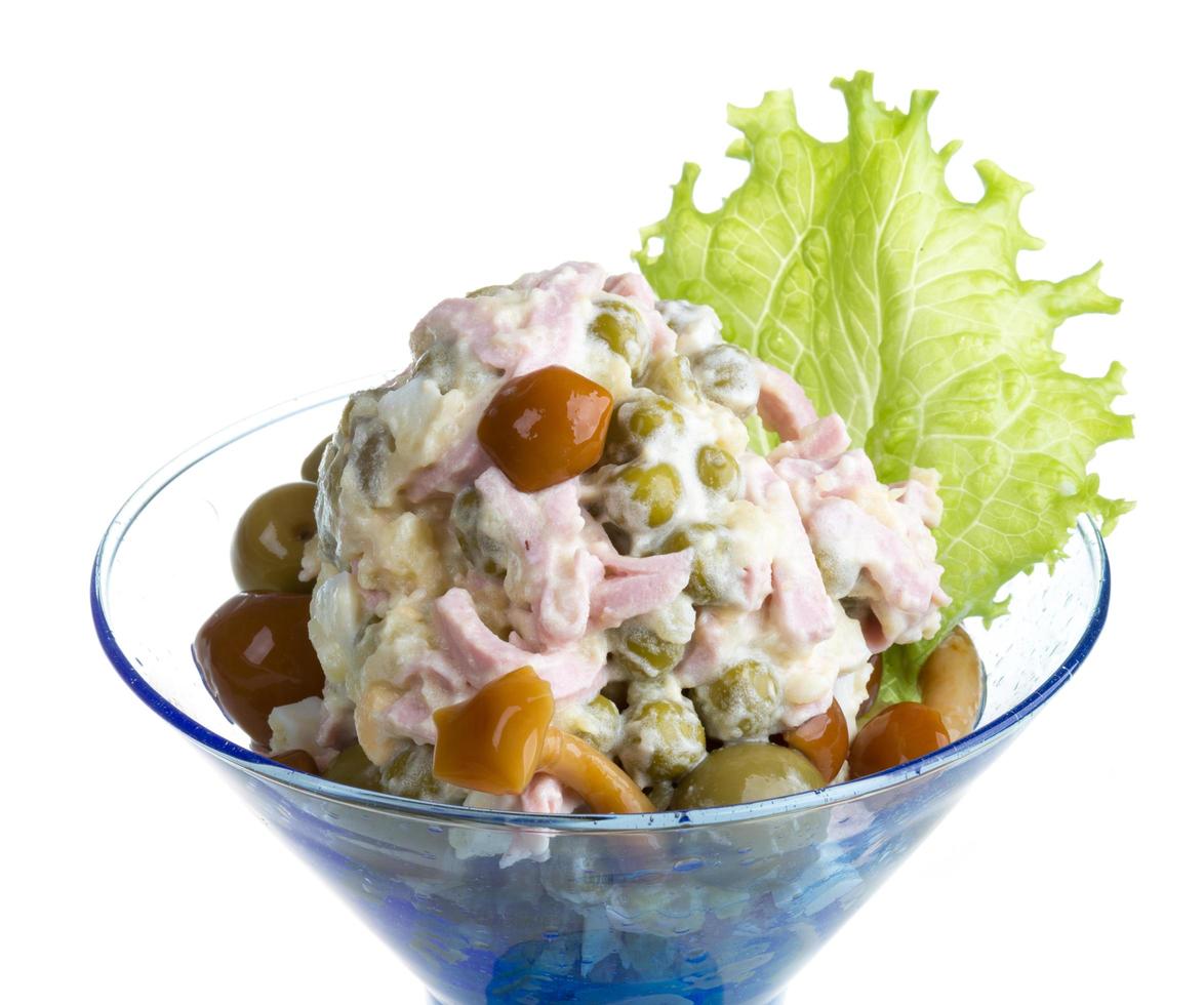 Russian salad on white photo