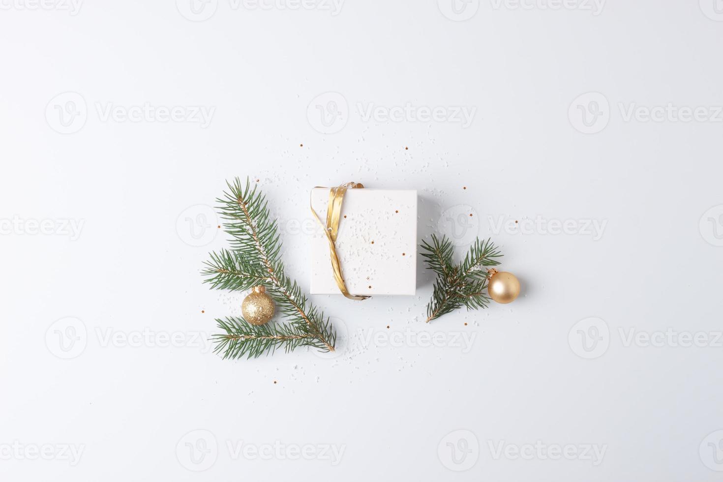 Christmas decorations with gift on white background. Flat lay, copy space photo