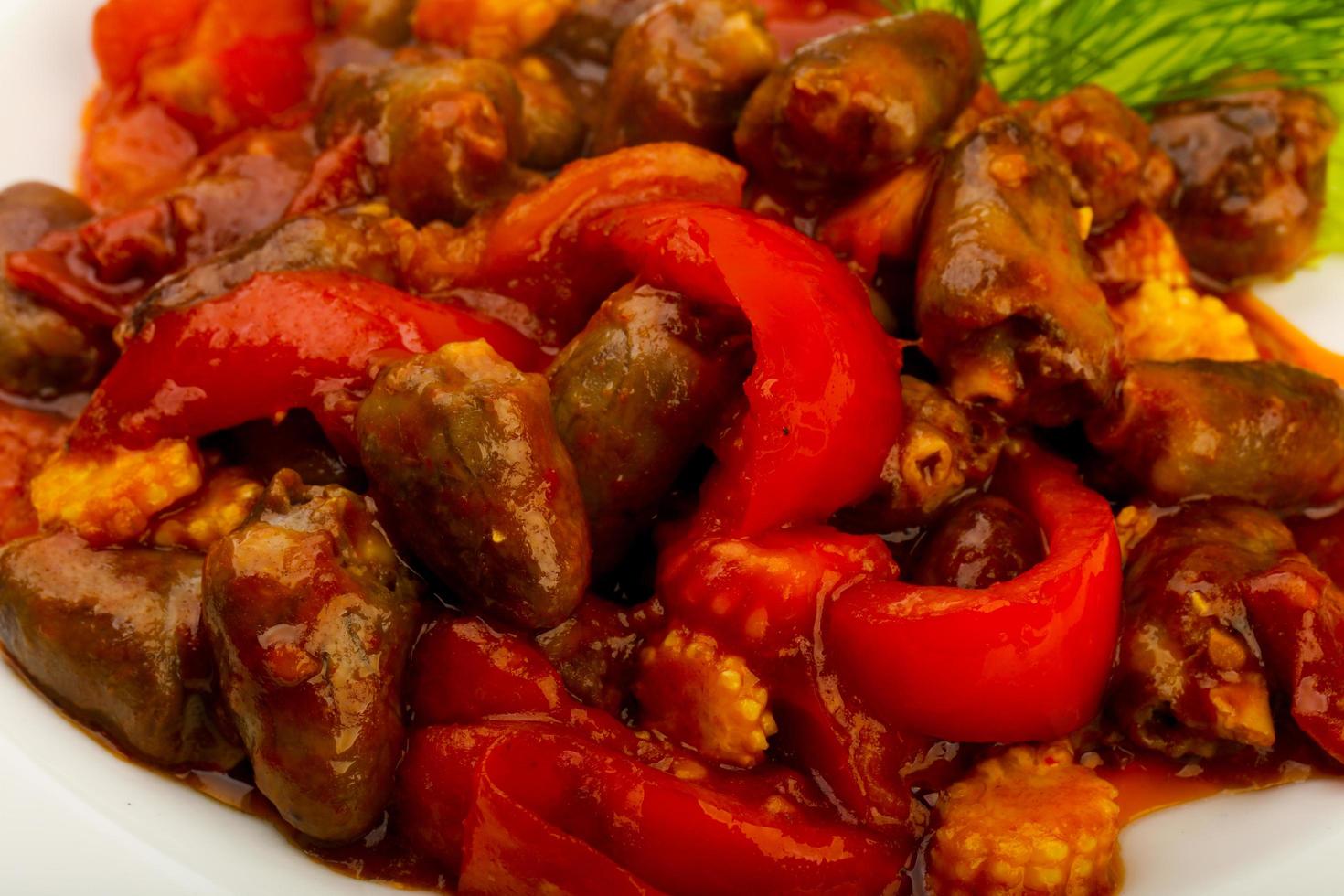 Chicken hearts close up view photo
