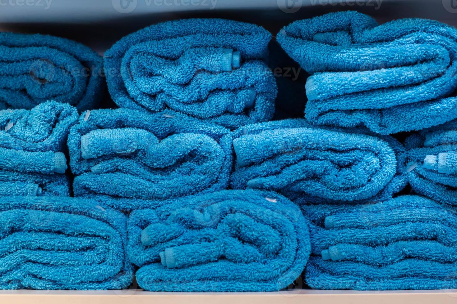 pile of Blue towel arranging in layer photo