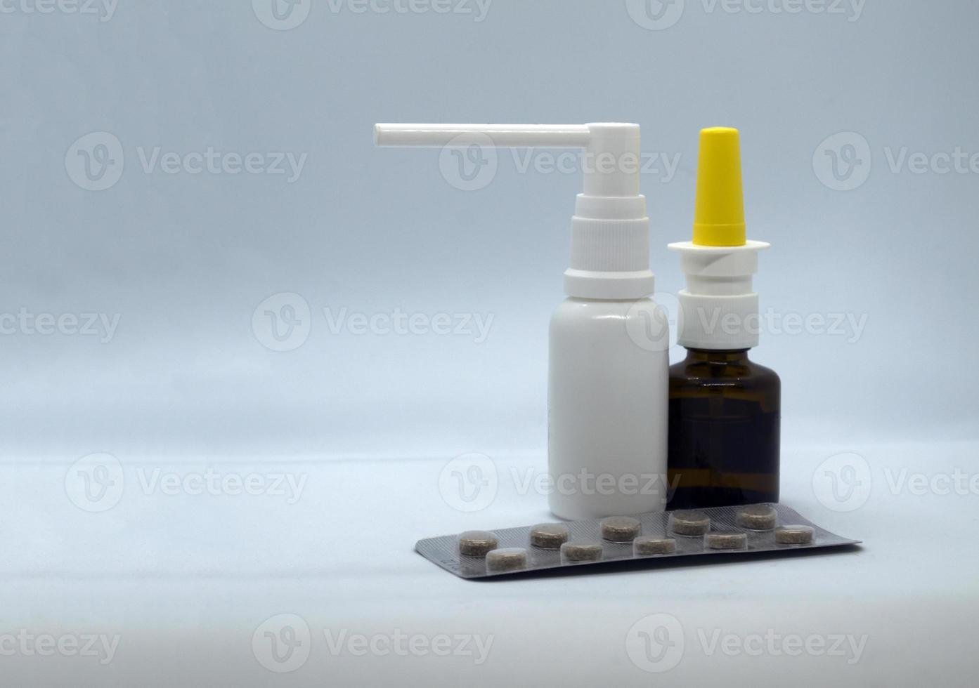 Throat spray, pills and nasal drops photo