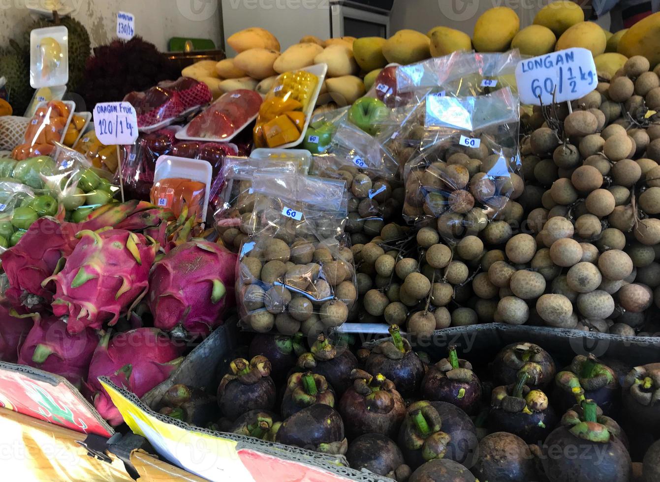 Thailand, Phuket, food market. View of the counter with exotic fruits. photo