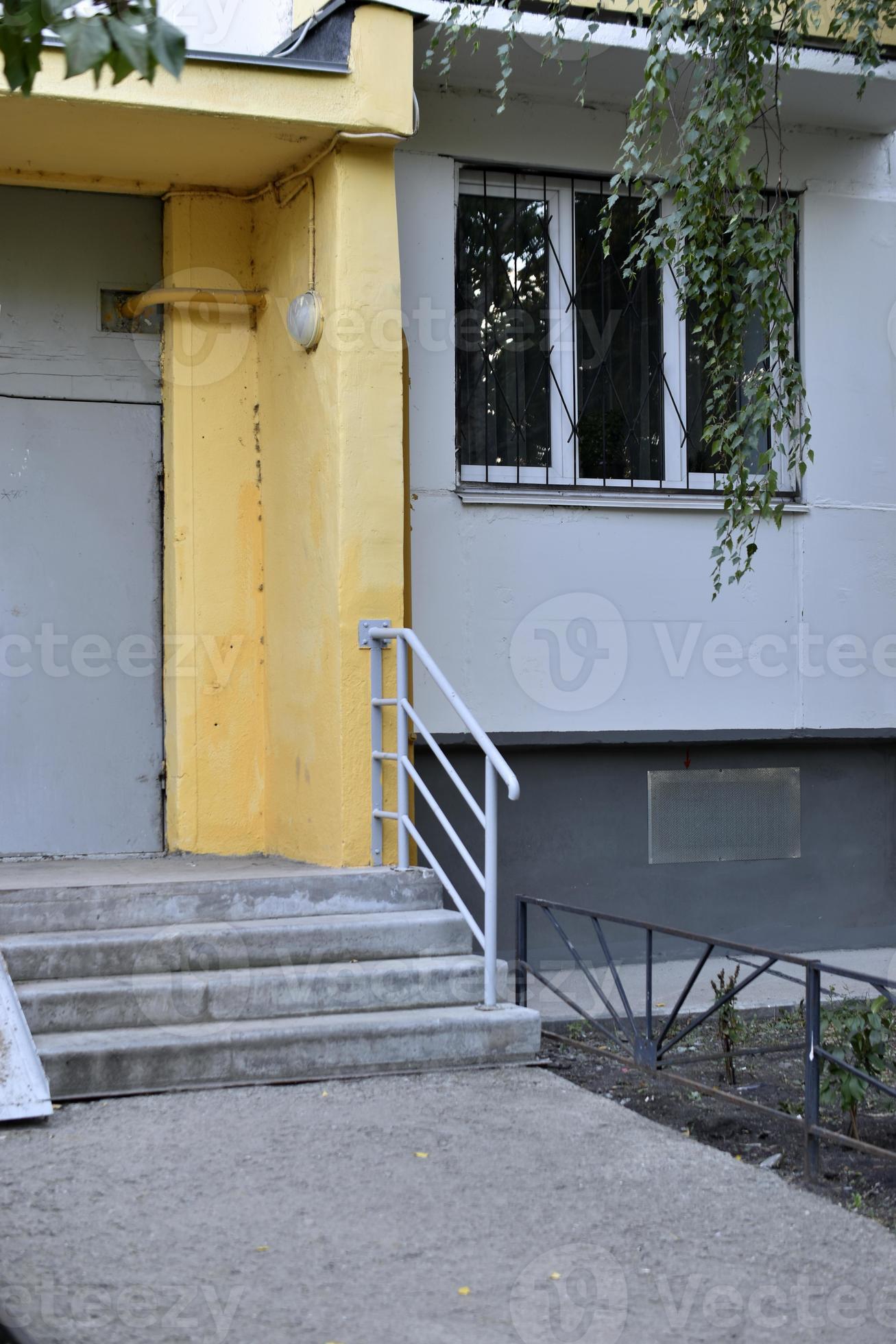 clean-entrance-of-a-multi-storey-building-in-the-city-the-iron-door-of