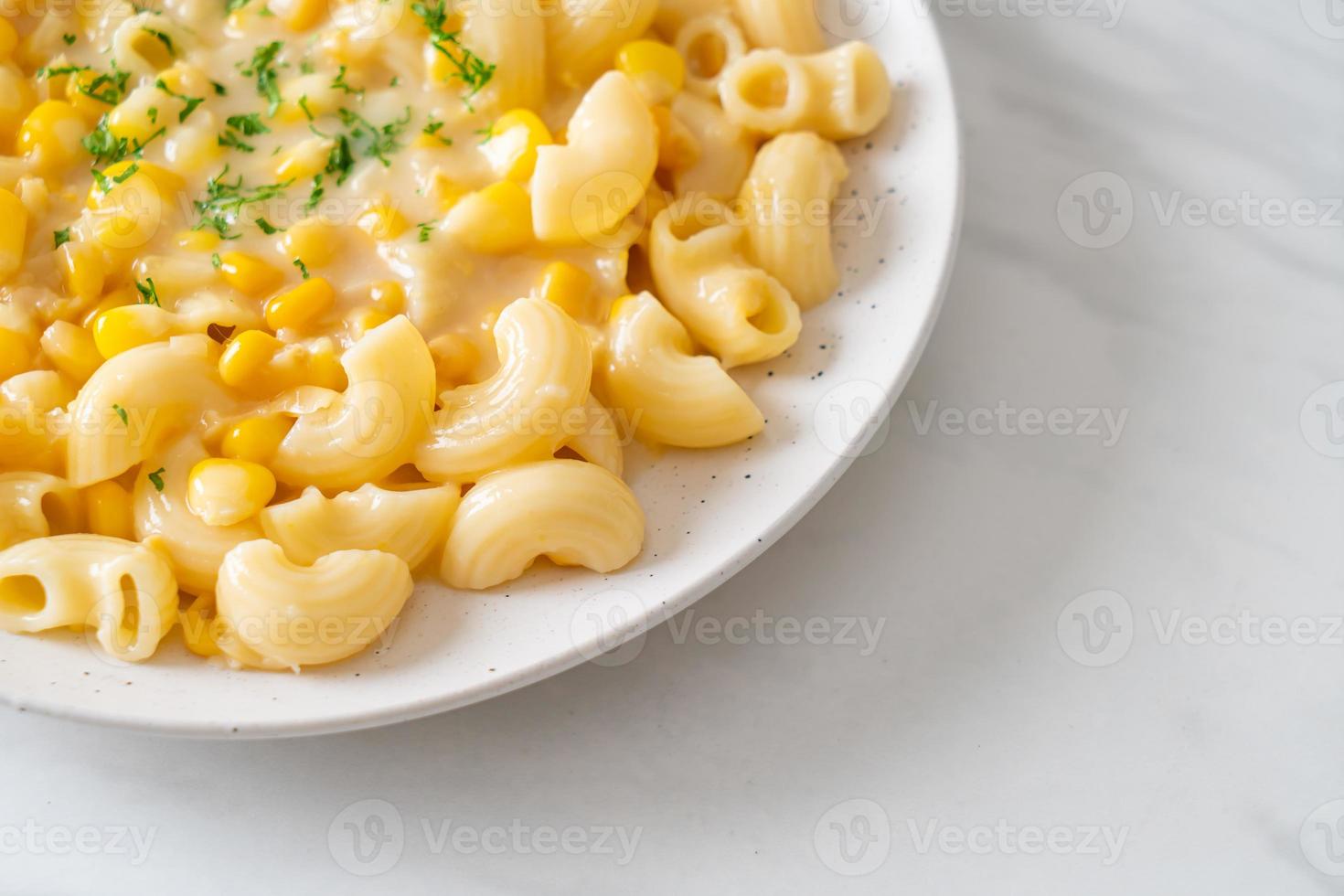 macaroni creamy corn cheese on plate photo