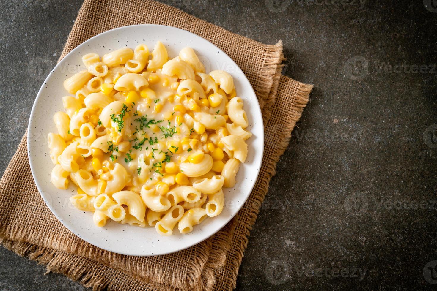 macaroni creamy corn cheese on plate photo