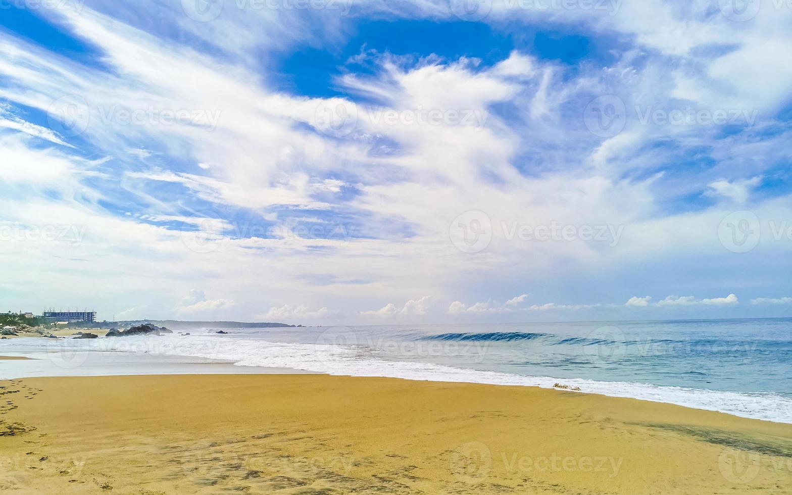 Beach with beautiful huge big surfer waves Puerto Escondido Mexico. photo