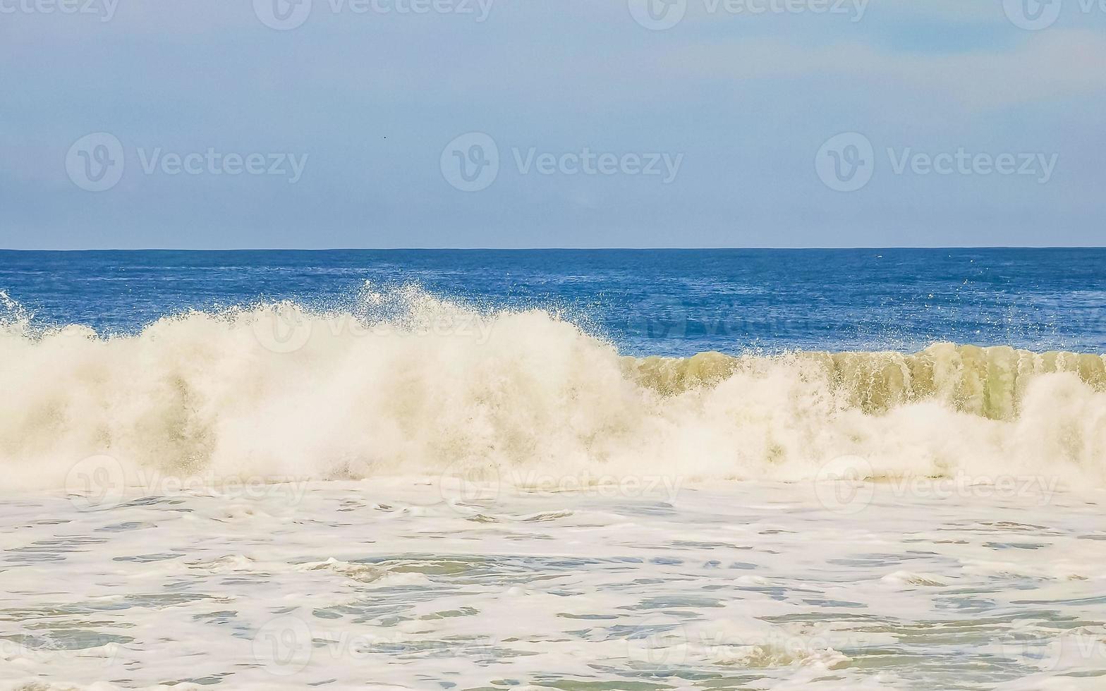 Extremely huge big surfer waves at beach Puerto Escondido Mexico. photo