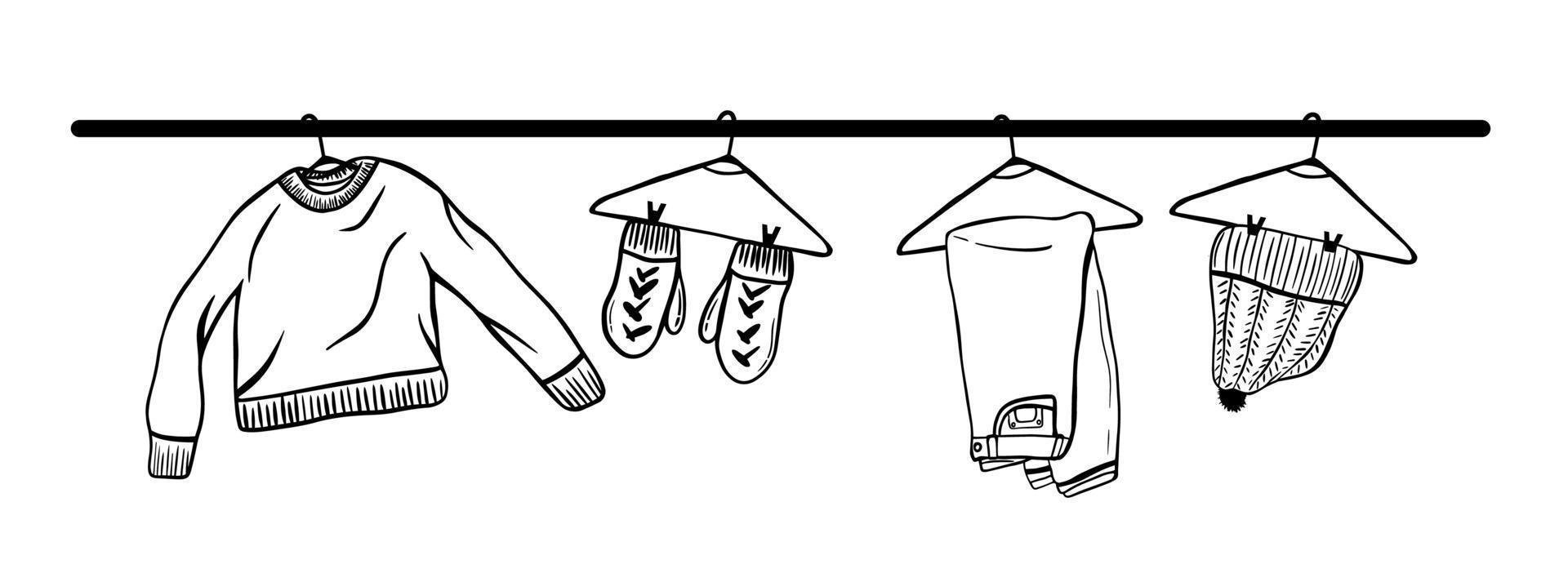 Hand-drawn set of warm clothes on a hanger vector
