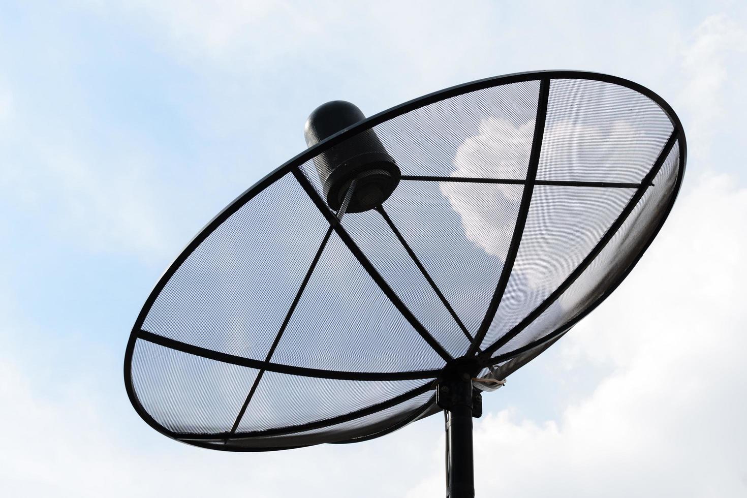 Satellite dish over sky photo