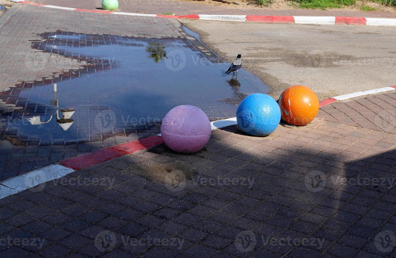 Road barriers along the sidewalk for the safe passage of pedestrians. photo
