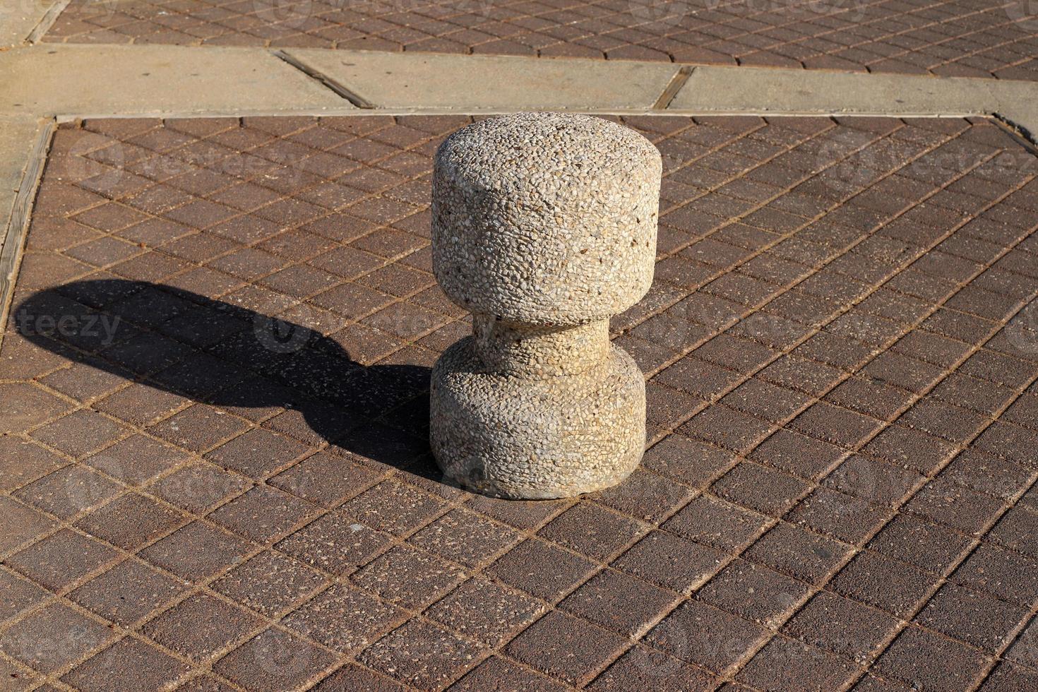 Road barriers along the sidewalk for the safe passage of pedestrians. photo