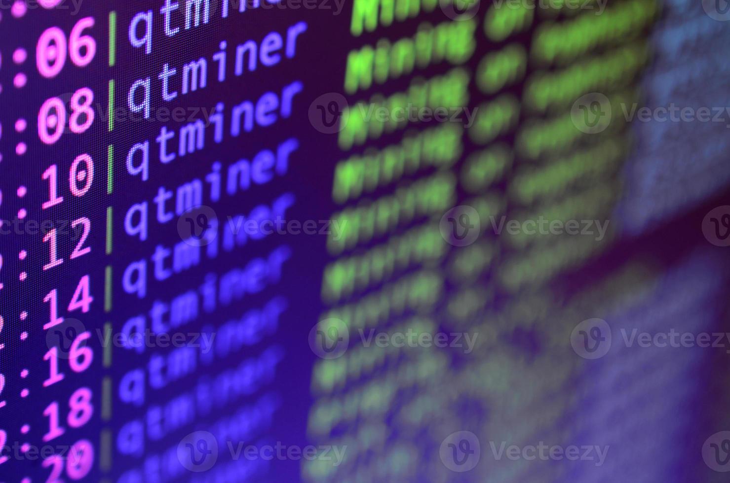 Macro snapshot of the program interface for crypto currency mining on the monitor of an office computer. The concept of mining bitcoins. The flow of information strings and data photo