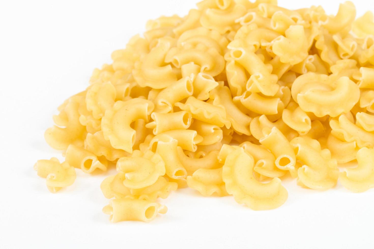 italian pasta macaroni isolated on white background photo